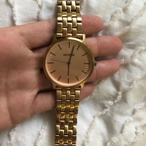 Men’s rose gold Nixon watch